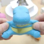 SQUISHY ELASTICO DINOSAURIO DE ARENA - Imagen 3
